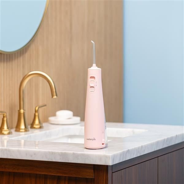 may tam nuoc khong day pink cordless pulse 3100 waterpik wf 20cd014 mau hong