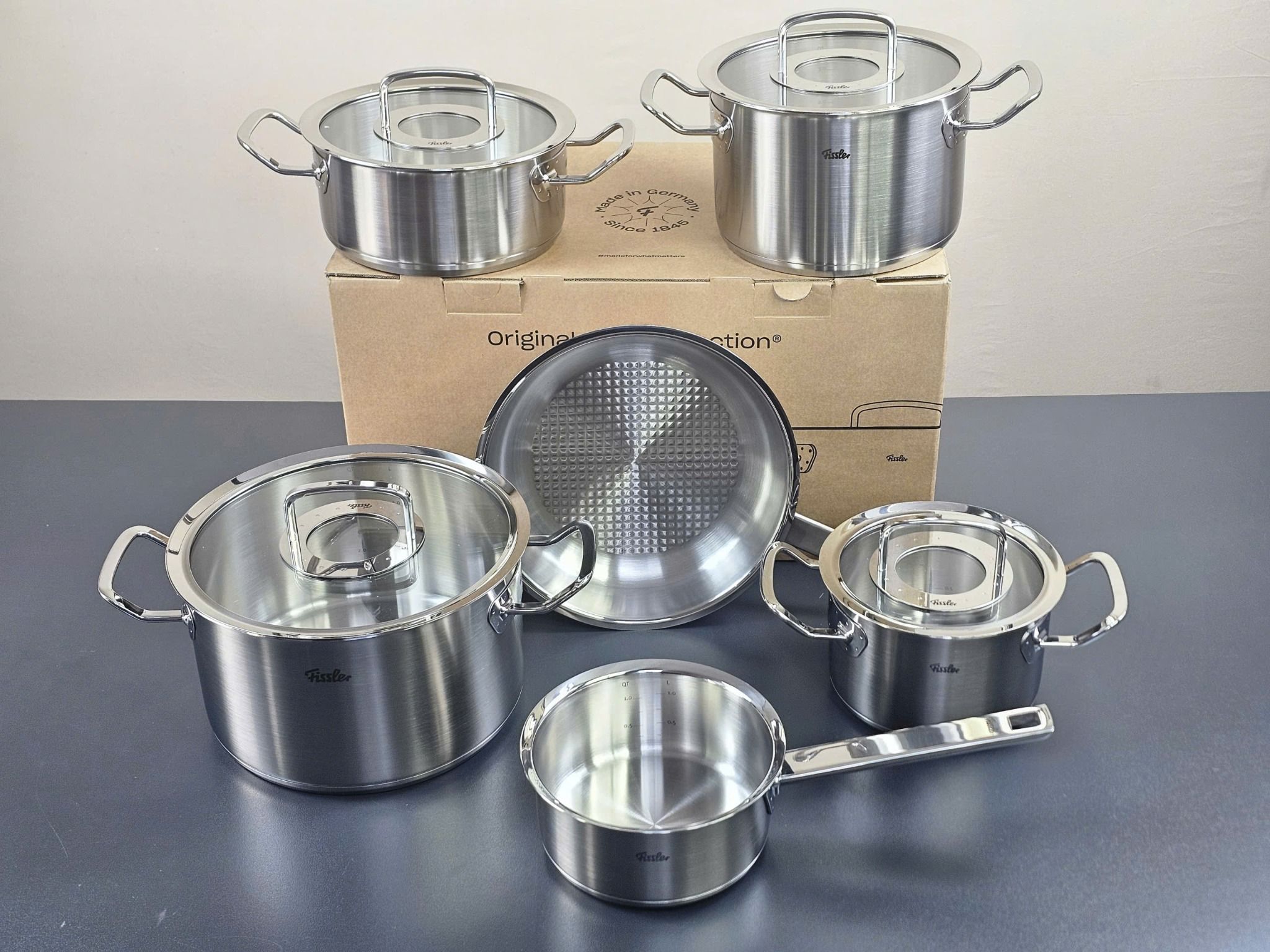 bo noi fissler profi 4 noi 1 quanh 1 chao inox profi nap kinh