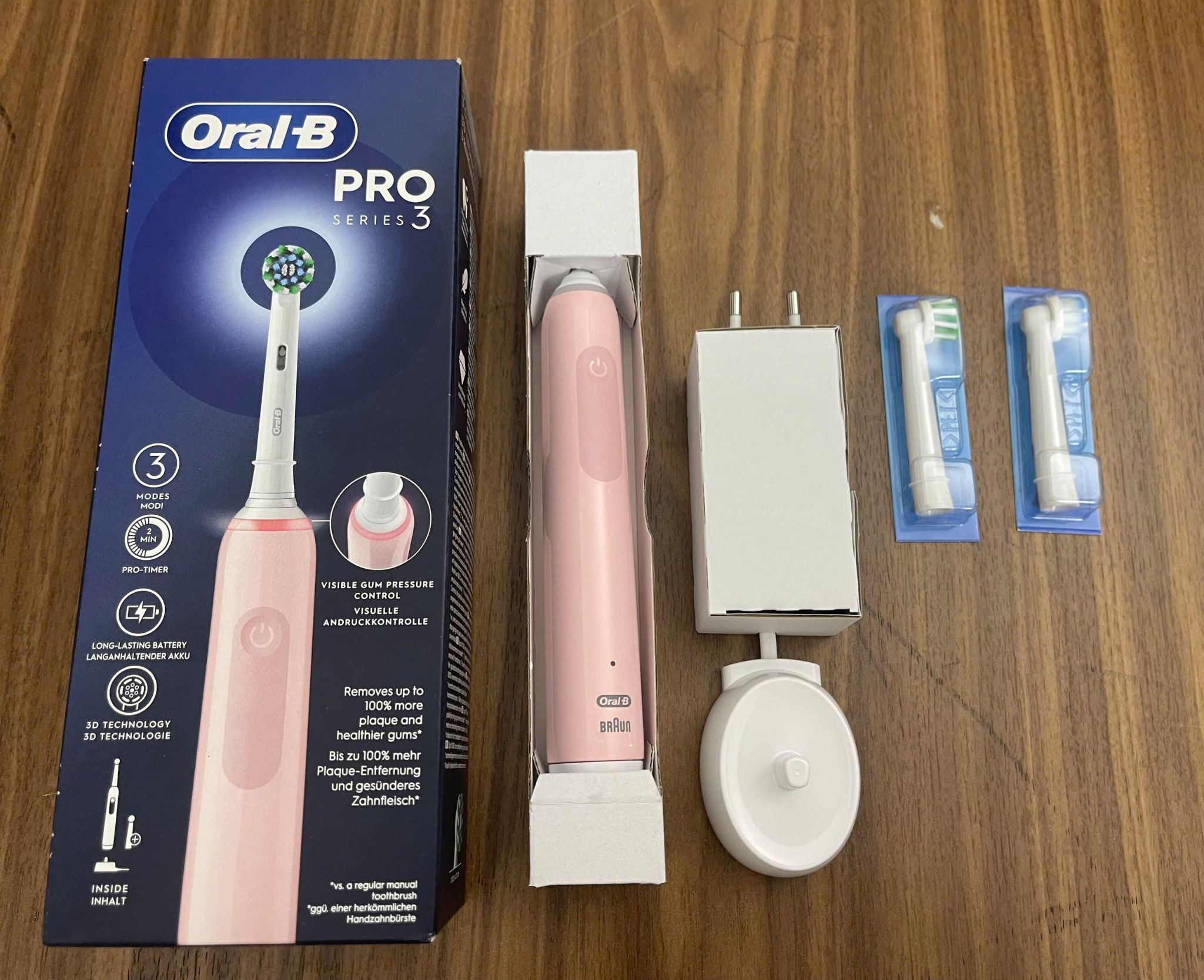 ban chai danh rang oral b pro series 3 mau hong kem 2 dau ban chai
