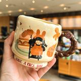 Ly cốc sứ - Cô bé