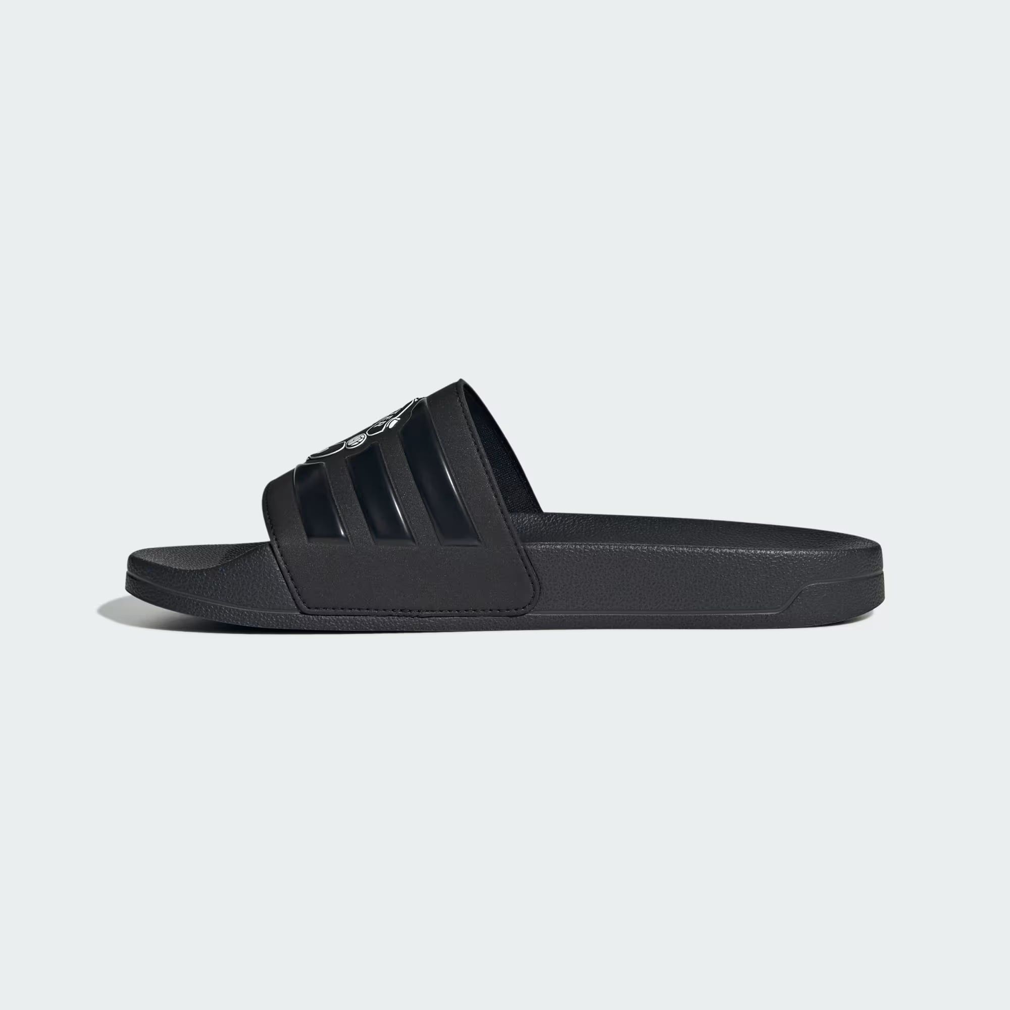  Dép quai ngang adidas Adilette Shower Manchester United Unisex - HQ2591 