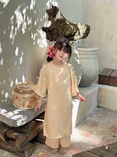  Áo Dài Yên Khuê – Cổ Bím Đính Nơ Dịu Dàng - Màu Vàng 