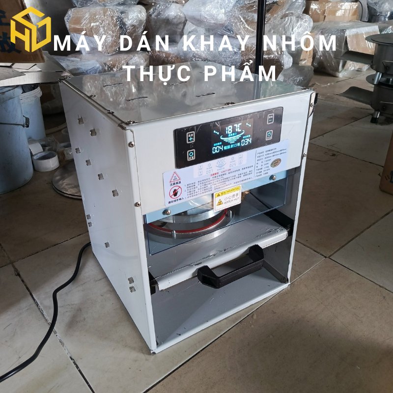 Máy dán khay nhôm đựng thực phẩm