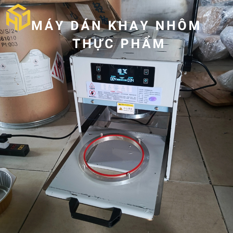 Máy dán khay nhôm đựng thực phẩm
