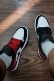  Giày Nike Air Jordan 1 Low Black Toe 2025  IB8971-106 