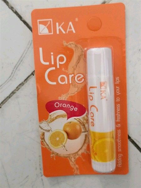 Son dưỡng môi không màu ka lip care orange