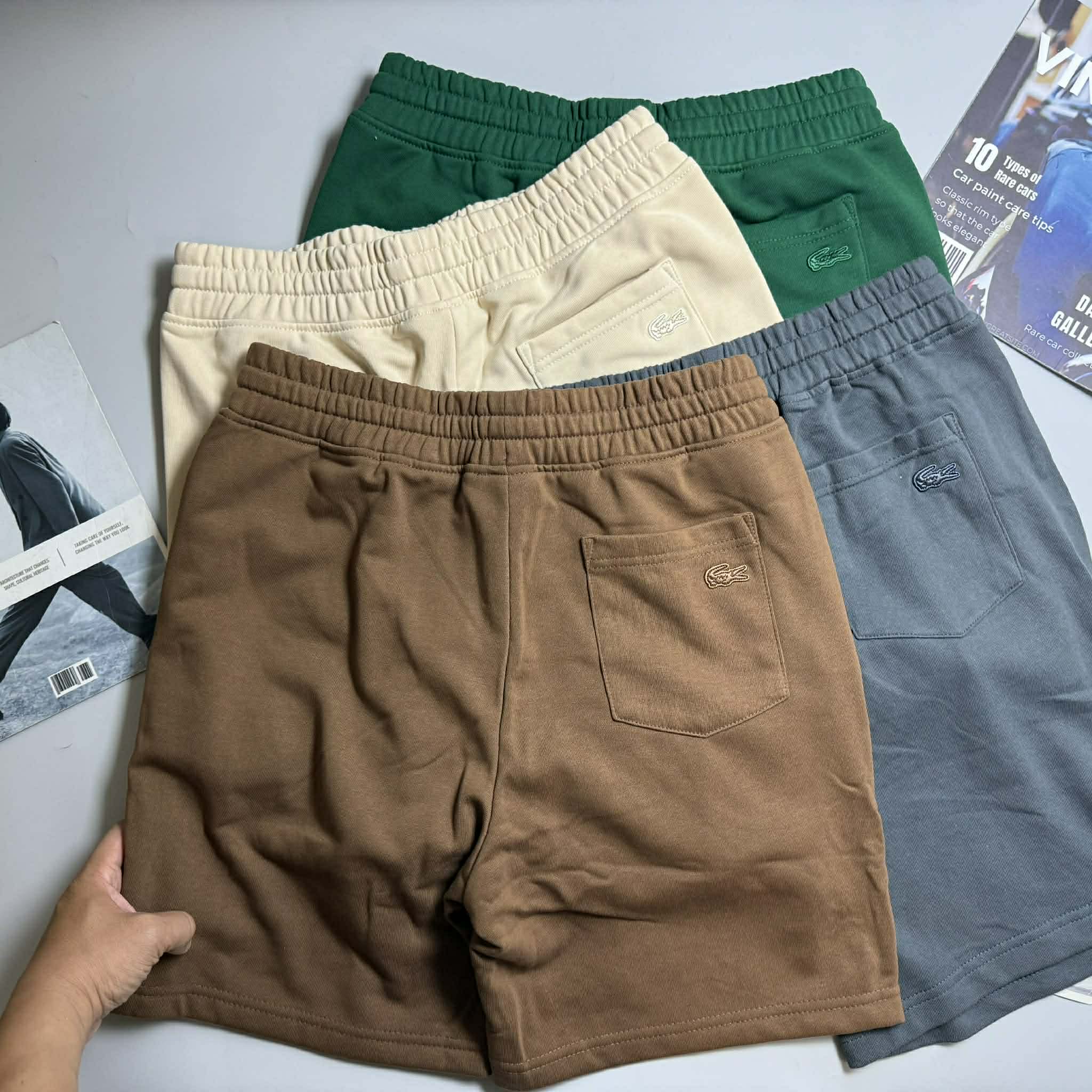 SHORT NỈ LA.COSTE CHỮ IN & LOGO TÚI SAU 6625