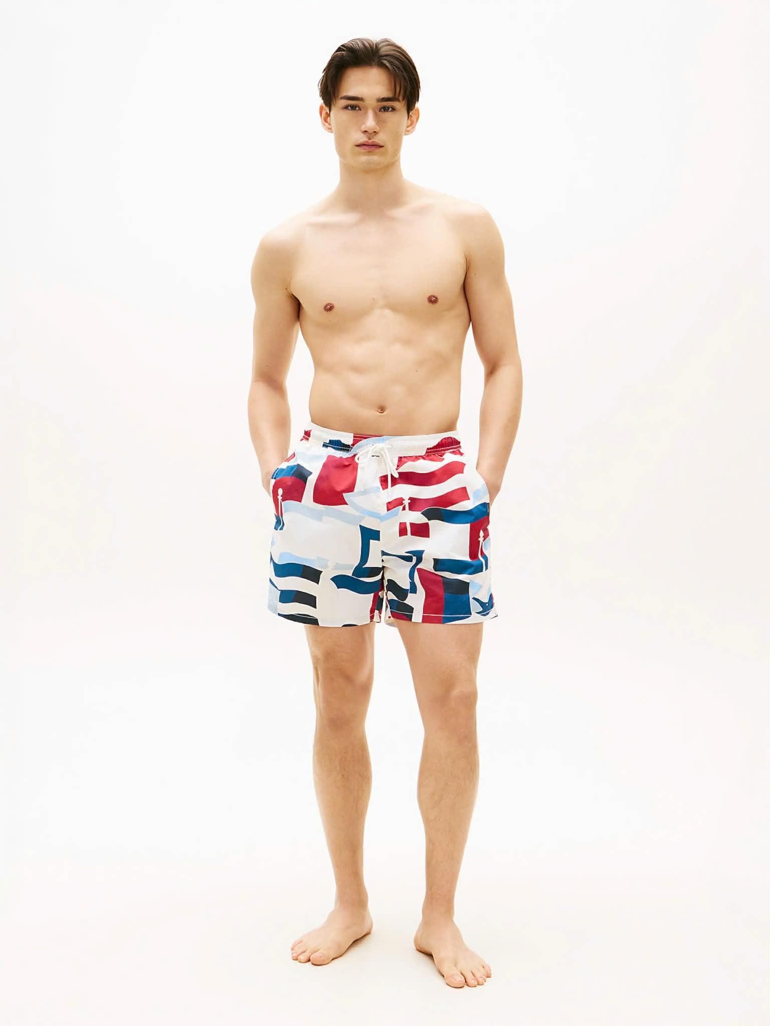 QUẦN BƠI TOMMY HỌA TIẾT LOGO 5667