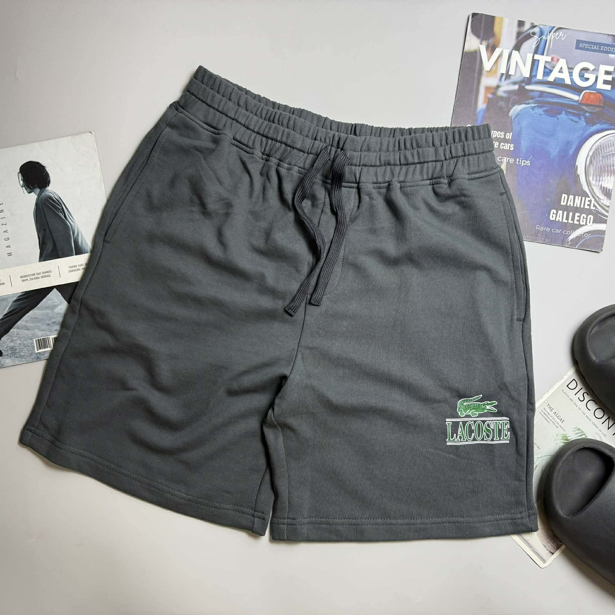 SHORT NỈ LA.COSTE CHỮ IN & LOGO TÚI SAU 6625