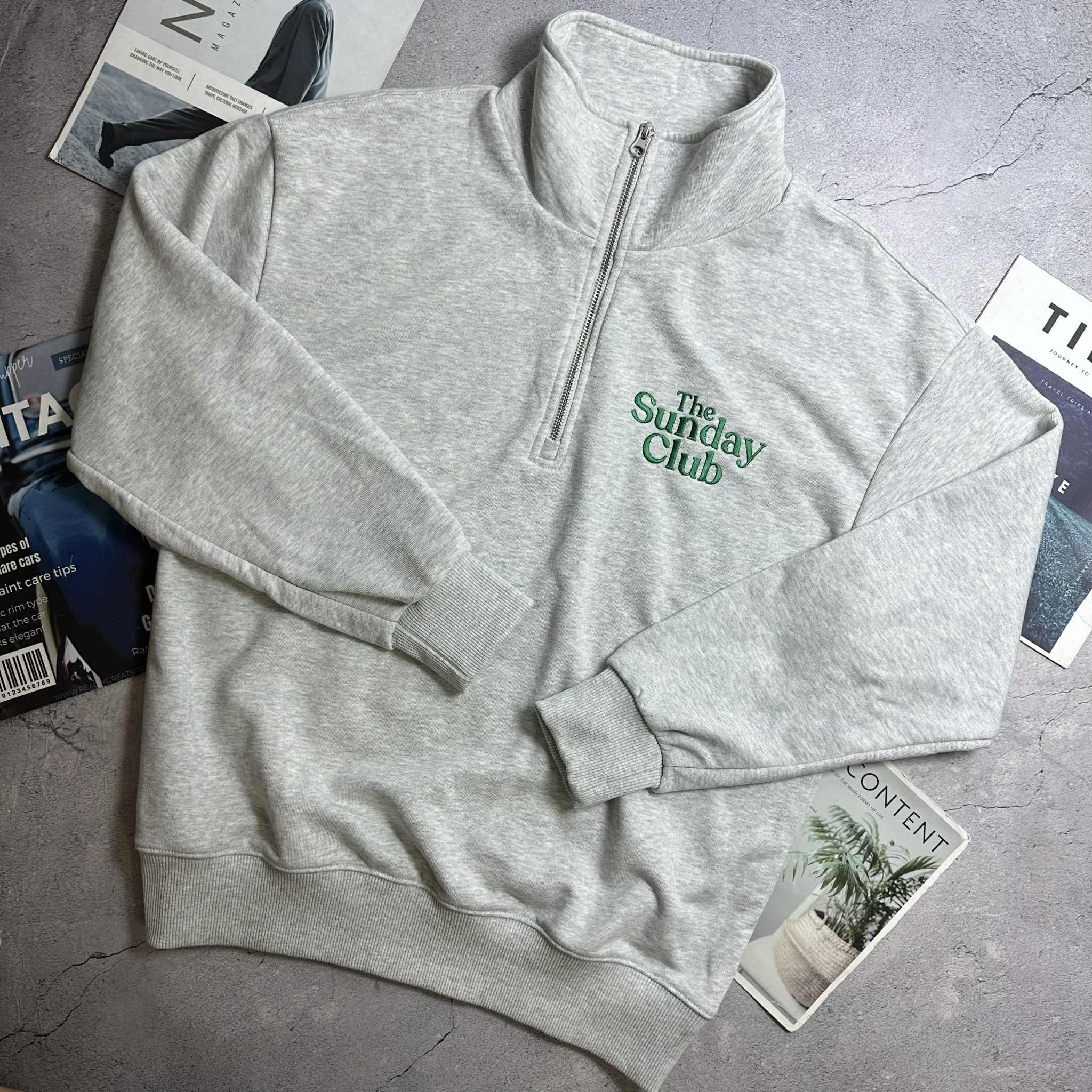 ÁO NỈ CỔ KHÓA SPAO THE SUNDAY CLUB 5219