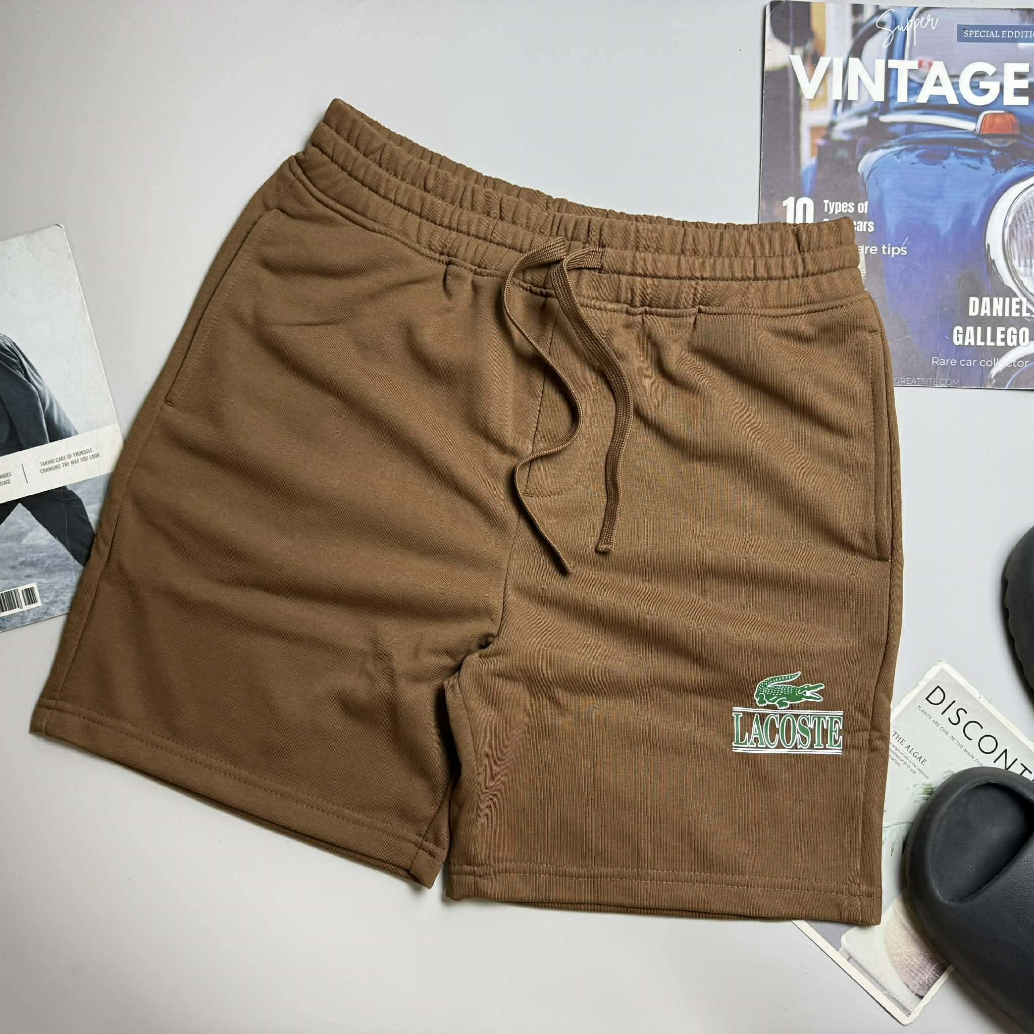 SHORT NỈ LA.COSTE CHỮ IN & LOGO TÚI SAU 6625