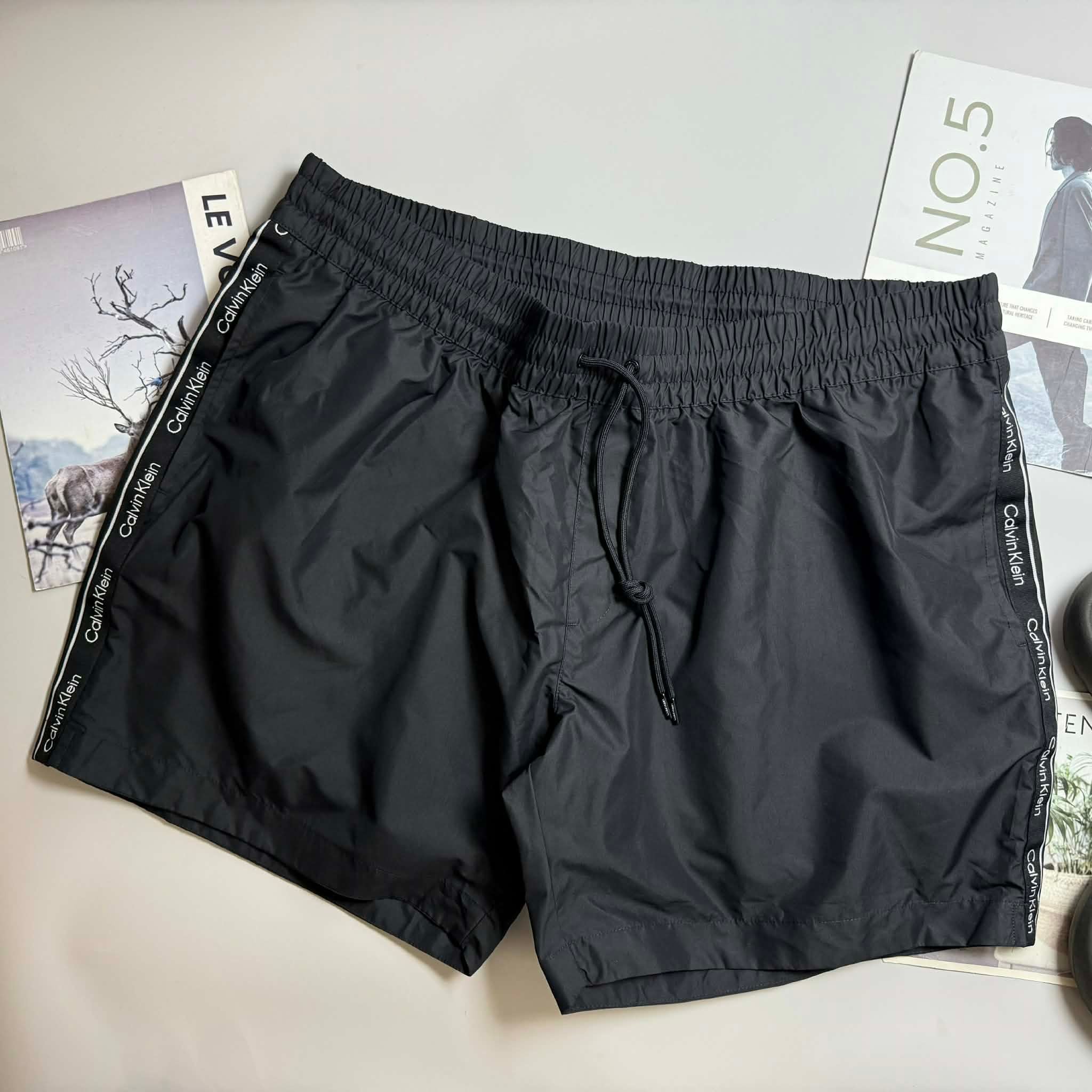 QUẦN BƠI C.K VẢI GIÓ LÓT LƯỚI 7157