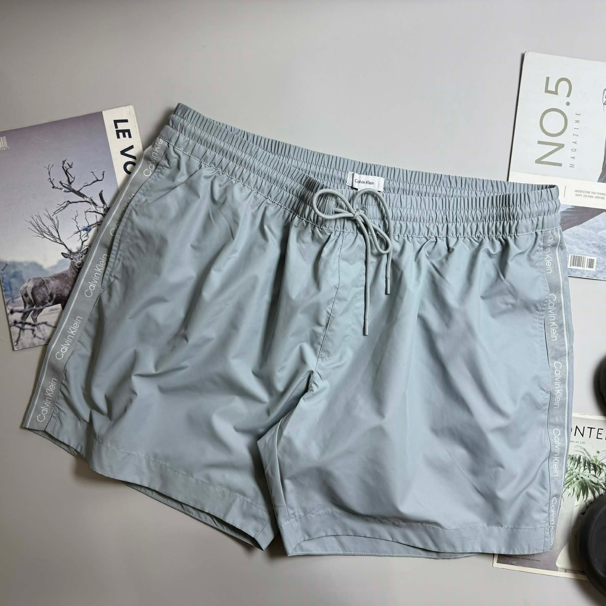 QUẦN BƠI C.K VẢI GIÓ LÓT LƯỚI 7157