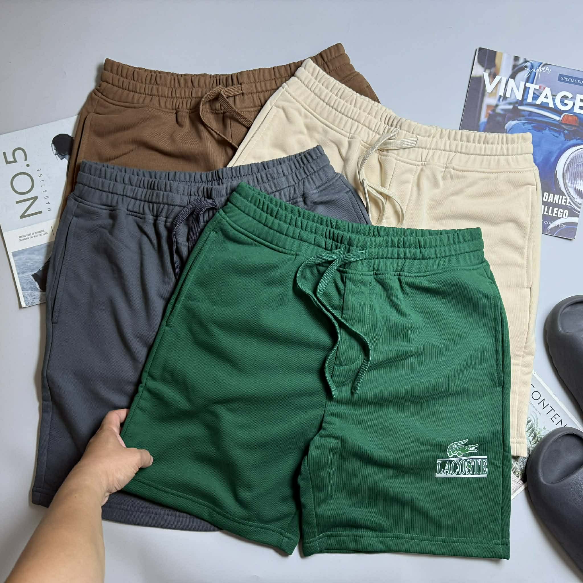 SHORT NỈ LA.COSTE CHỮ IN & LOGO TÚI SAU 6625