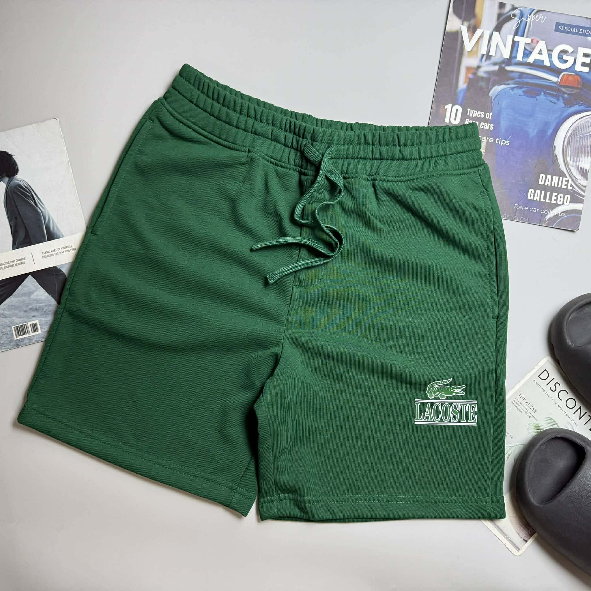 SHORT NỈ LA.COSTE CHỮ IN & LOGO TÚI SAU 6625