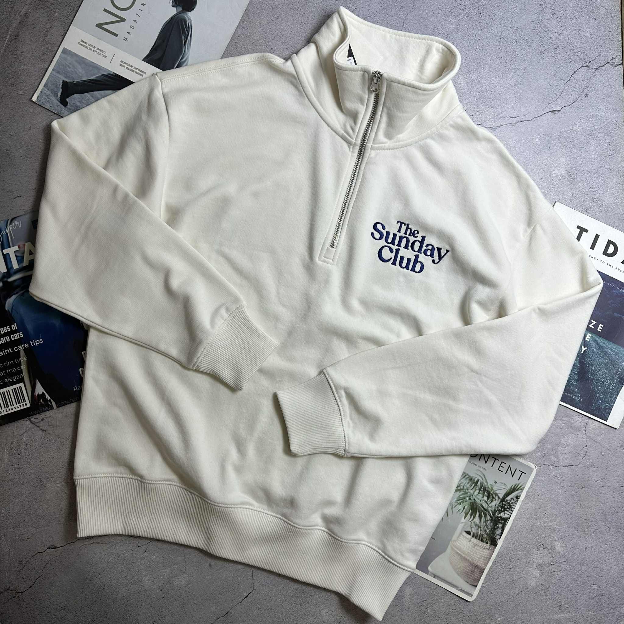 ÁO NỈ CỔ KHÓA SPAO THE SUNDAY CLUB 5219