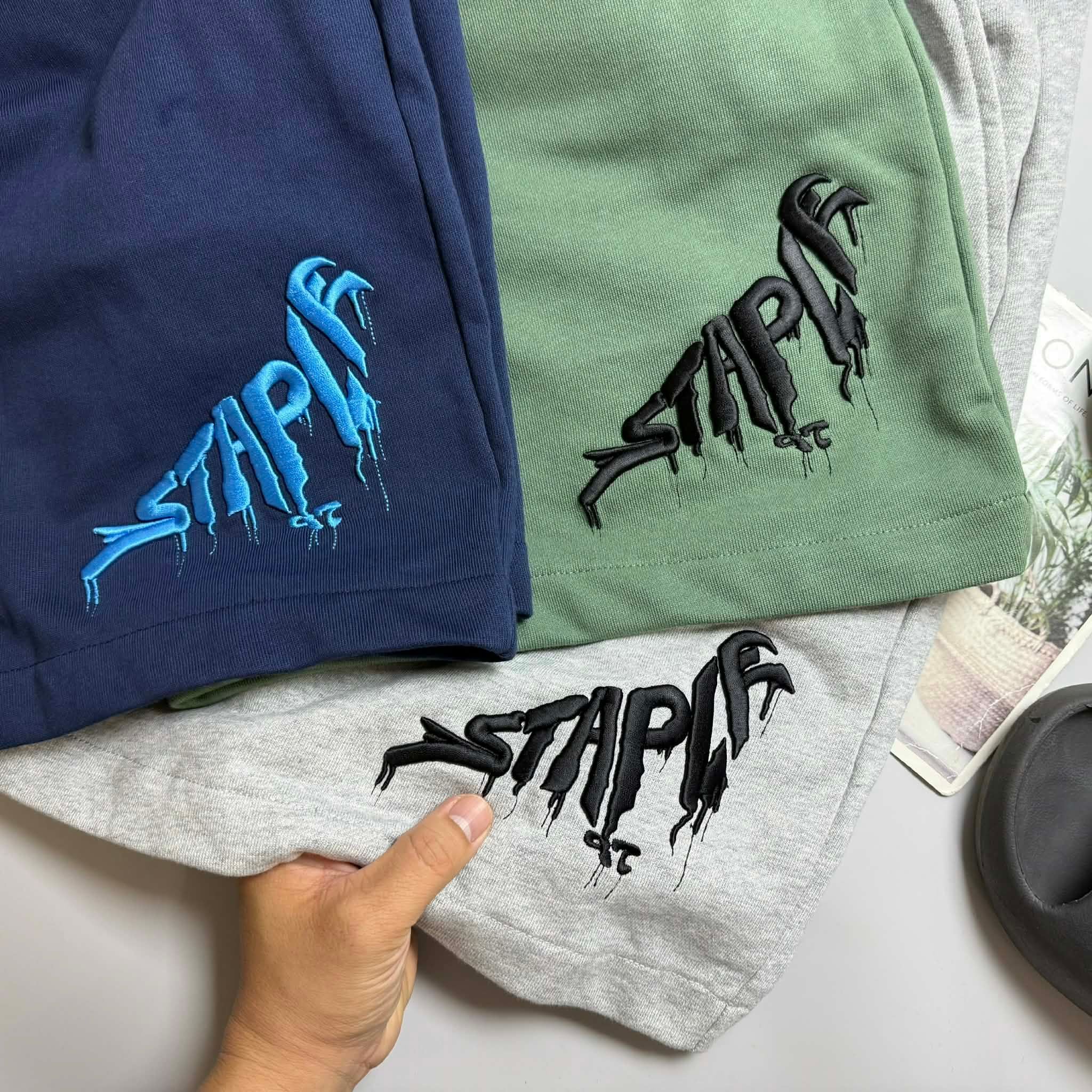 SHORT NỈ STAPLE CHỮ THÊU 5595