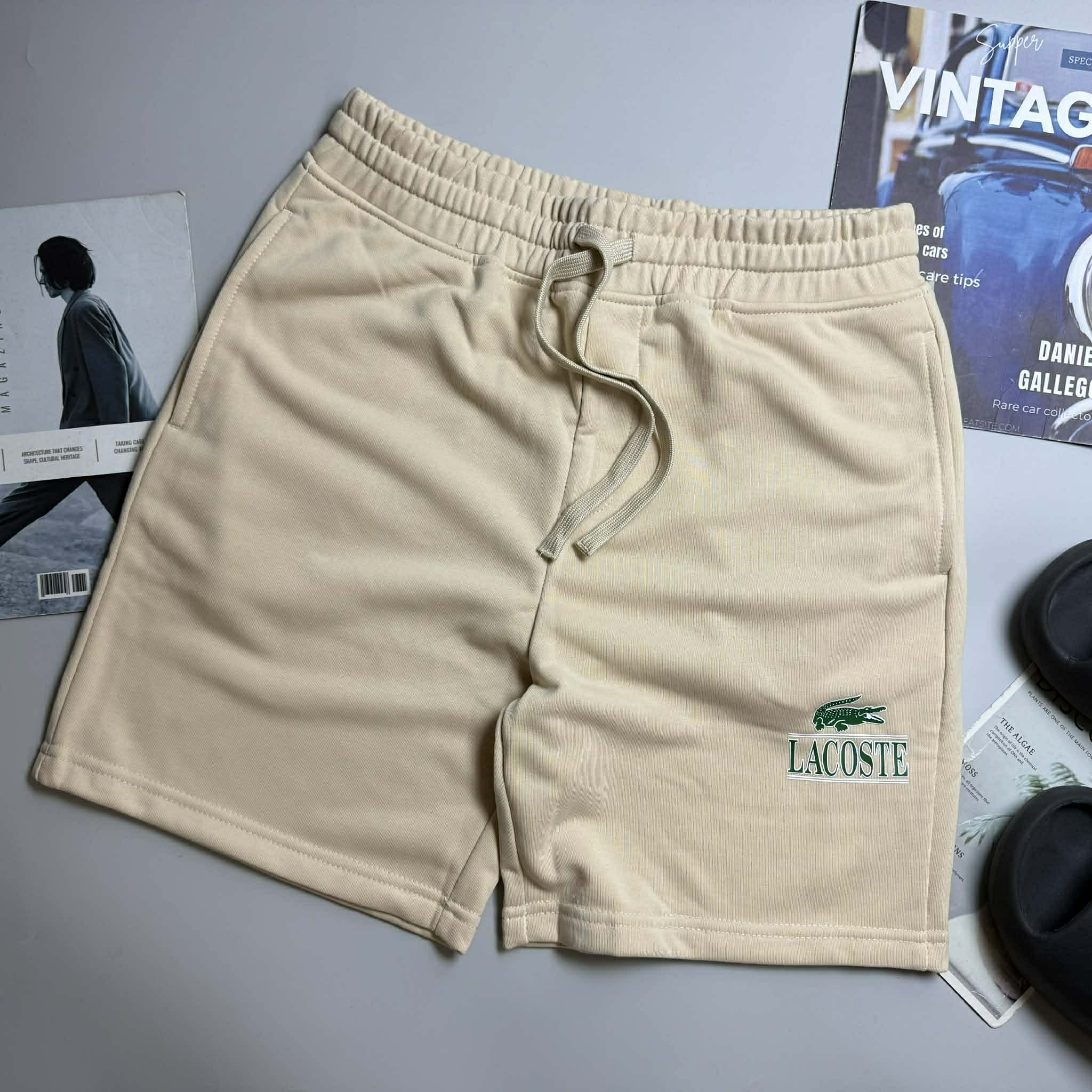 SHORT NỈ LA.COSTE CHỮ IN & LOGO TÚI SAU 6625