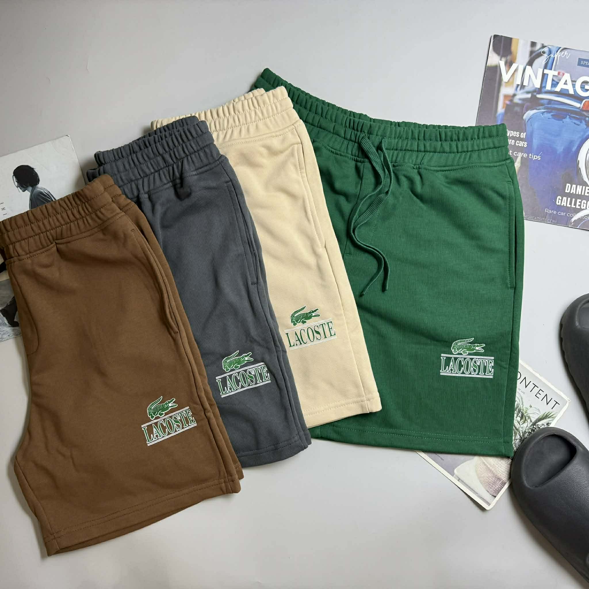 SHORT NỈ LA.COSTE CHỮ IN & LOGO TÚI SAU 6625