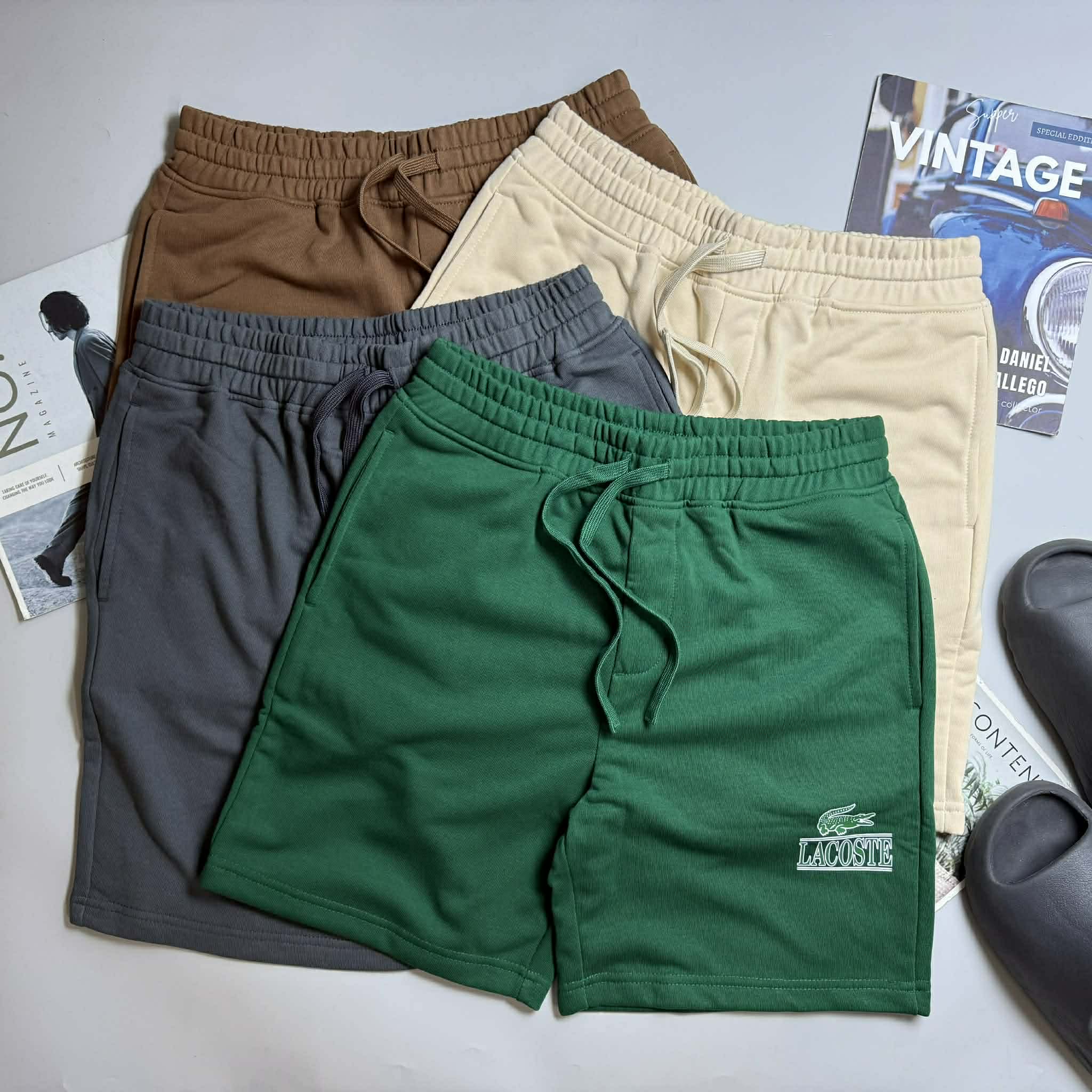 SHORT NỈ LA.COSTE CHỮ IN & LOGO TÚI SAU 6625