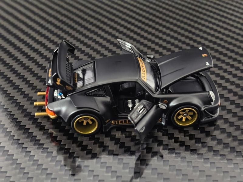  Mô hình xe RWB 930 Stella Artois Matte Black livery đi kèm fig tỉ lệ 1:64 HG Model OT64850 