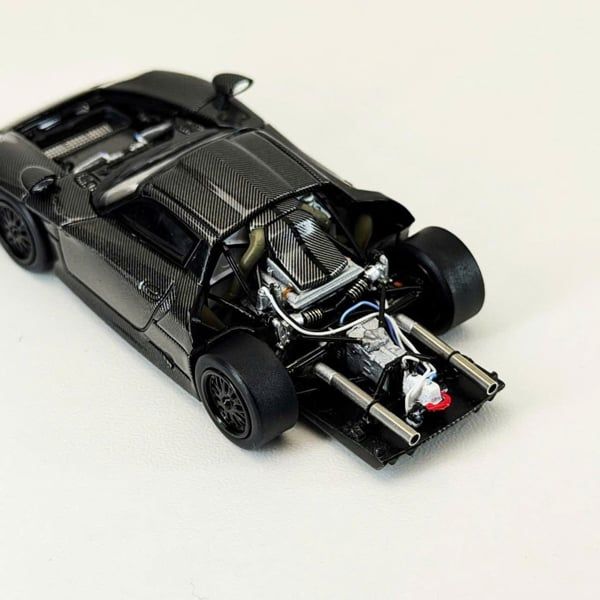  Mô hình xe 911 GT1(LeMans GT1 1997) Full Carbon Black mở được nắp máy Limited 500pcs tỉ lệ 1:64 Transcend model OT64863 