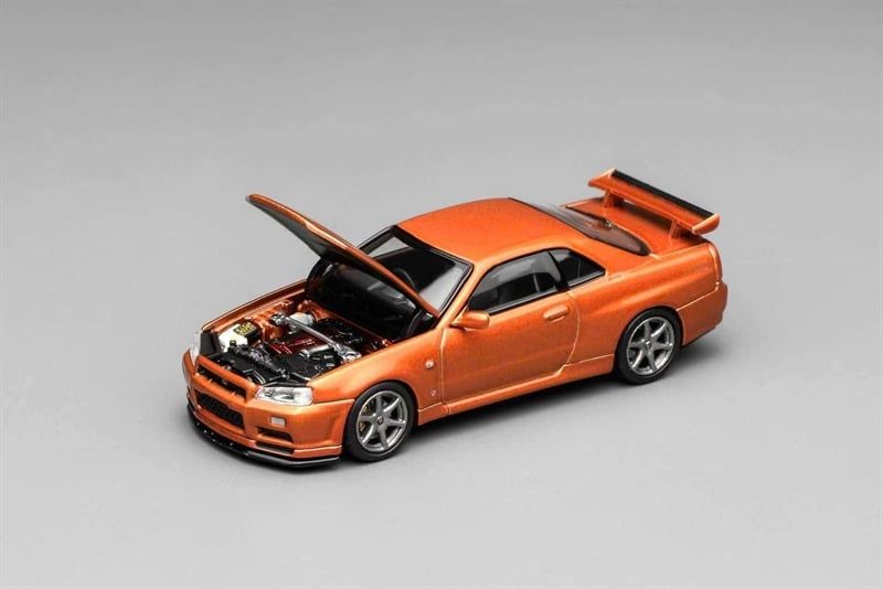  Mô hình xe Nissan Skyline GT-R (R34) V-Spec II Customized Metallic Orange tỉ lệ 1:64 Motorhelix M63471 