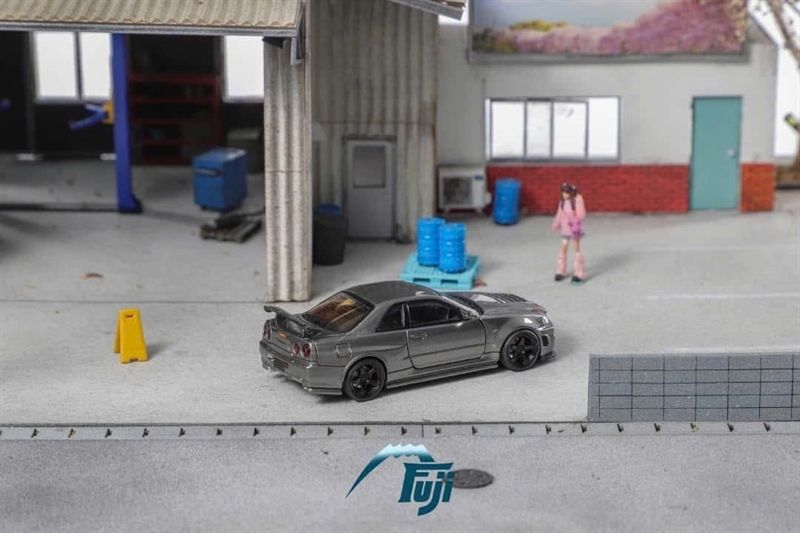  Mô hình xe Nissan Skyline GT-R R34 Z-Tune tỉ lệ 1:64 Fuji model OT64526 