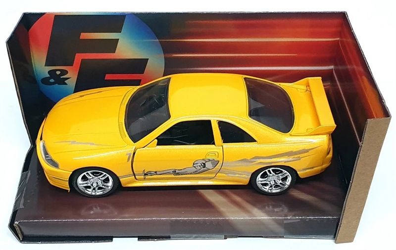  Mô hình xe Leon's Nissan Skyline GT-R (BCNR33), Yellow Fast & Furious tỉ lệ 1:32 Jada 24075-44 