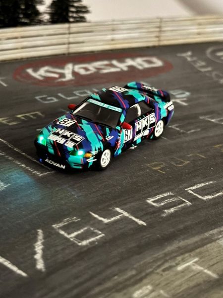  Mô hình xe Nissan Skyline GT-R R32 1993 HKS (MOTN Lighting System Front & Rear) tỉ lệ 1:64 Kyosho 