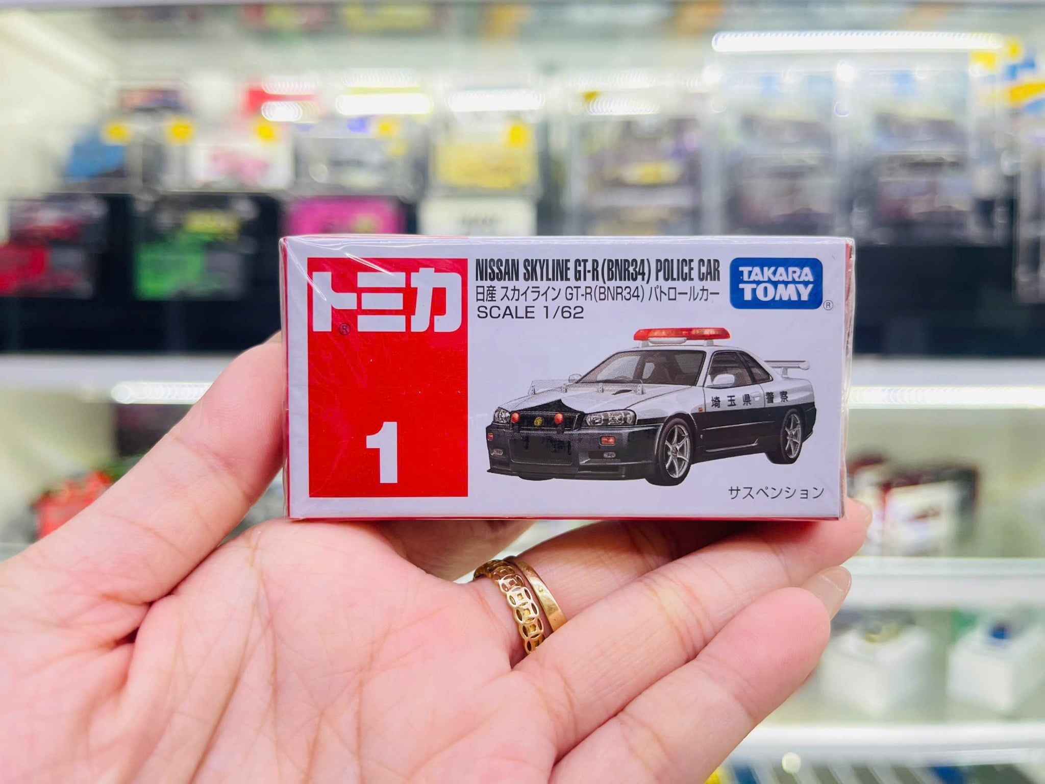  Mô hình xe No.1 Nissan Skyline GT-R (BNR34) Police Car tỉ lệ 1:62 Tomica 174868 