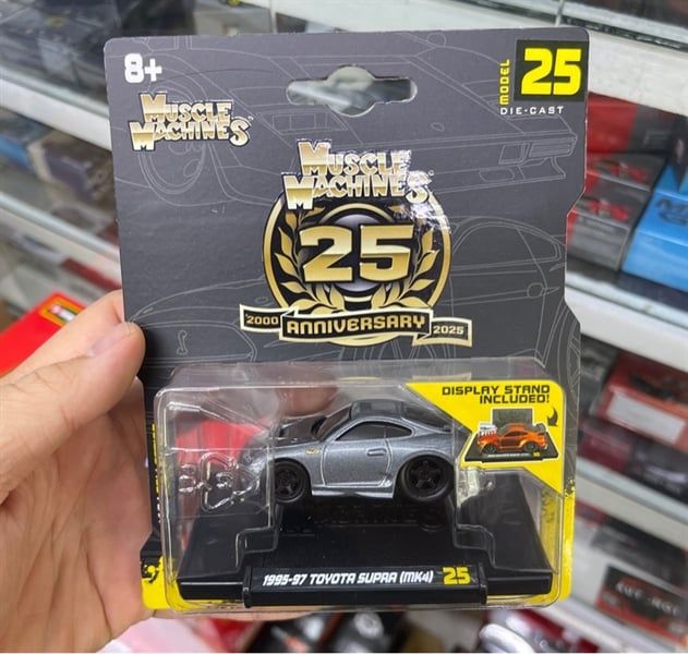  Mô hình xe Toyota Supra (MK4) 1995-97 grey 25th Anniversary - Muscle Machines bản card tỉ lệ 1:64 Maisto 15536 