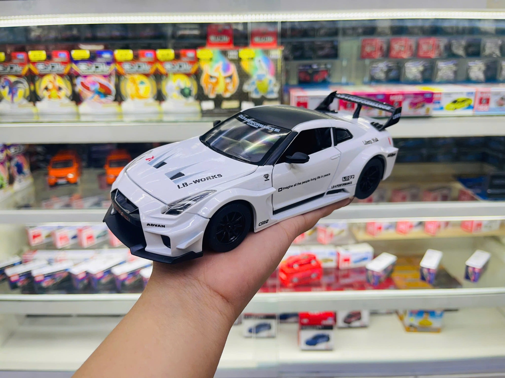  Mô hình xe Nissan GTR R35 CSR2 full open , có đèn , âm thanh 1:24 Alloy OT054 