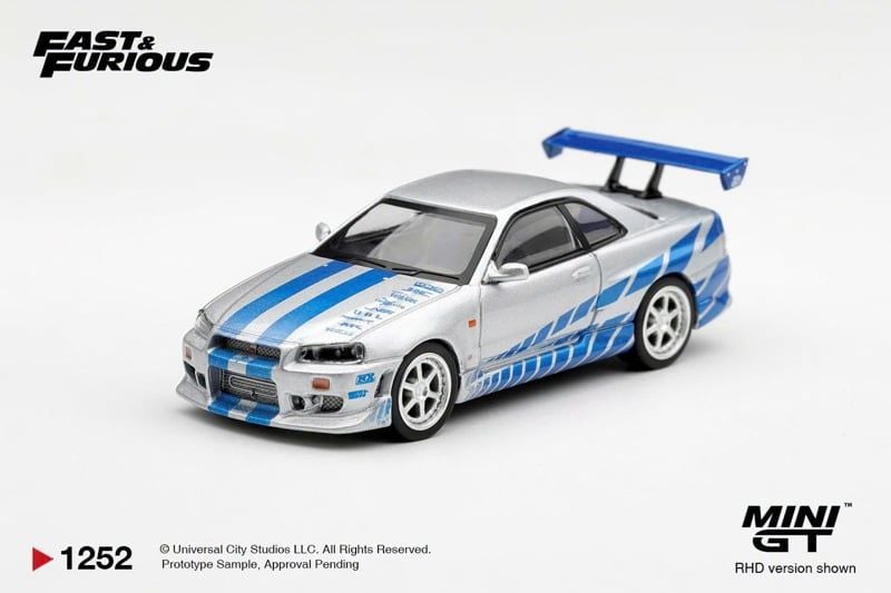  Mô hình xe Nissan Skyline GT-R C-West “2 Fast 2 Furious” Brian O’Conner bản card tỉ lệ 1:64 MiniGT MGT01252 