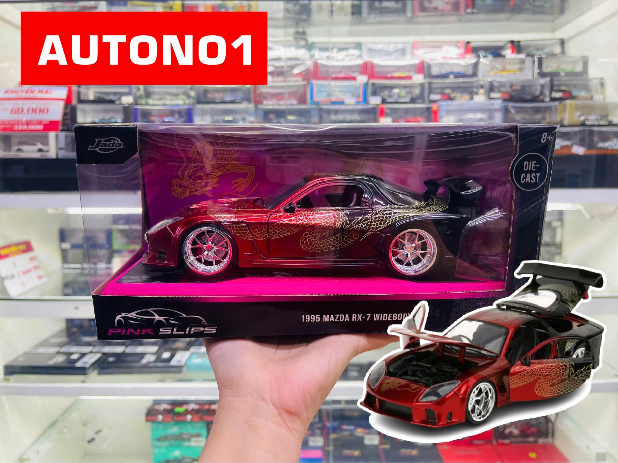  Mô hình xe 1995 Mazda RX7 Widebody (Year of the Dragon) Pink Slips tỉ lệ 1:24 Jada Toys 35194 