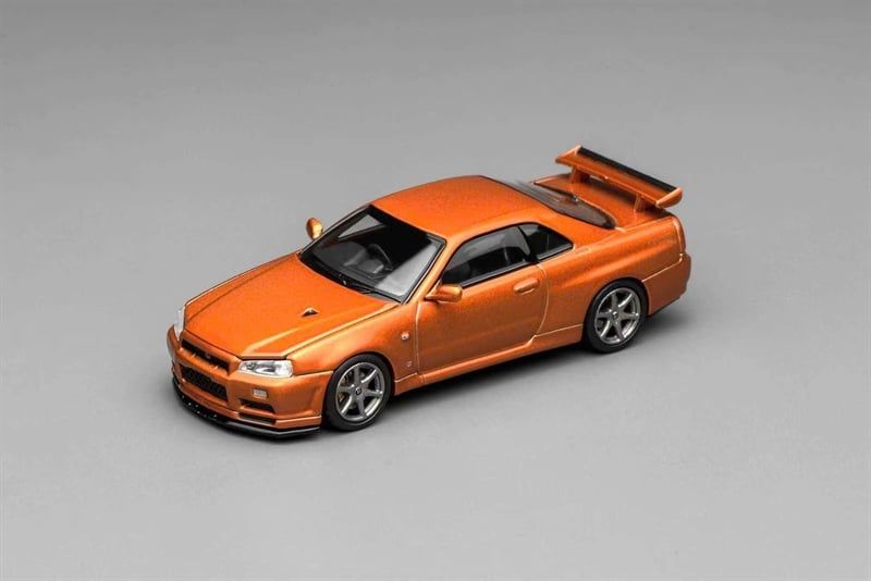  Mô hình xe Nissan Skyline GT-R (R34) V-Spec II Customized Metallic Orange tỉ lệ 1:64 Motorhelix M63471 