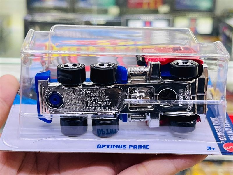  Mô hình xe tải Optimus prime Transformers Fantasy Hotwheels kim loại có bản quyền chính hãng tỉ lệ 1:64 C4982-FA 