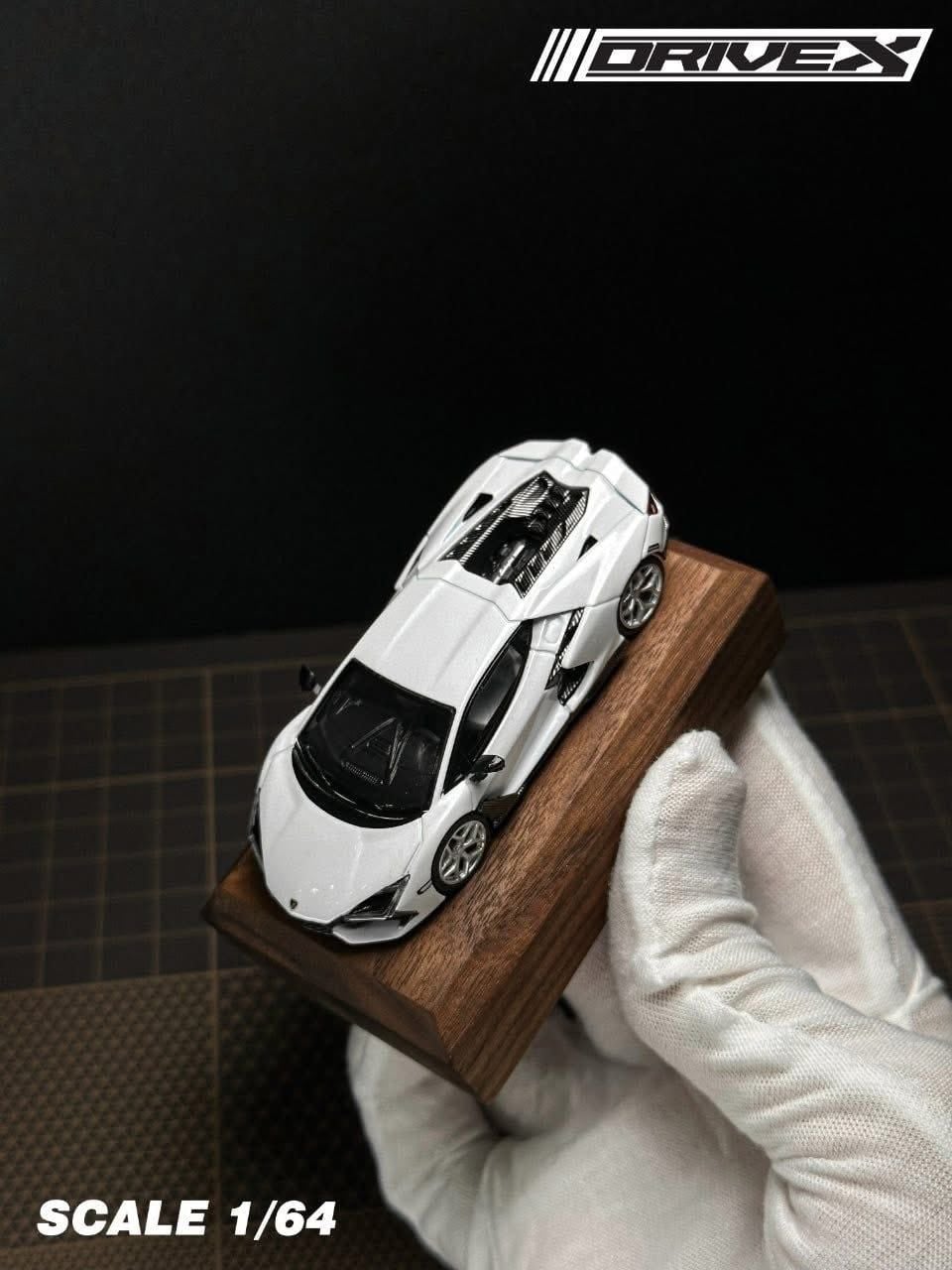  Mô hình xe lamorghini Revuelto Hanging Card Board Diecast Model tỉ lệ 1:64 Drive X OT64785 
