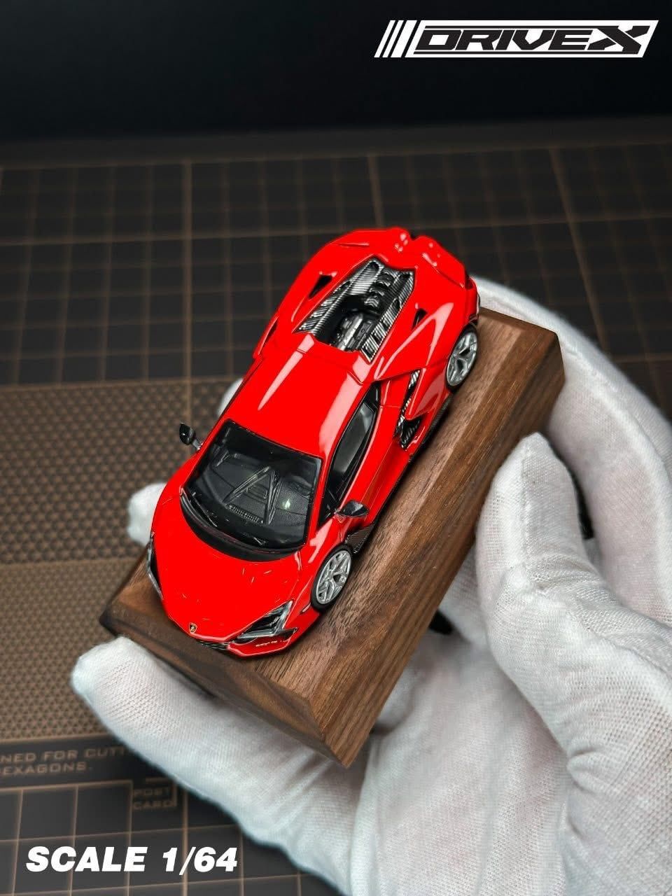  Mô hình xe lamorghini Revuelto Hanging Card Board Diecast Model tỉ lệ 1:64 Drive X OT64785 