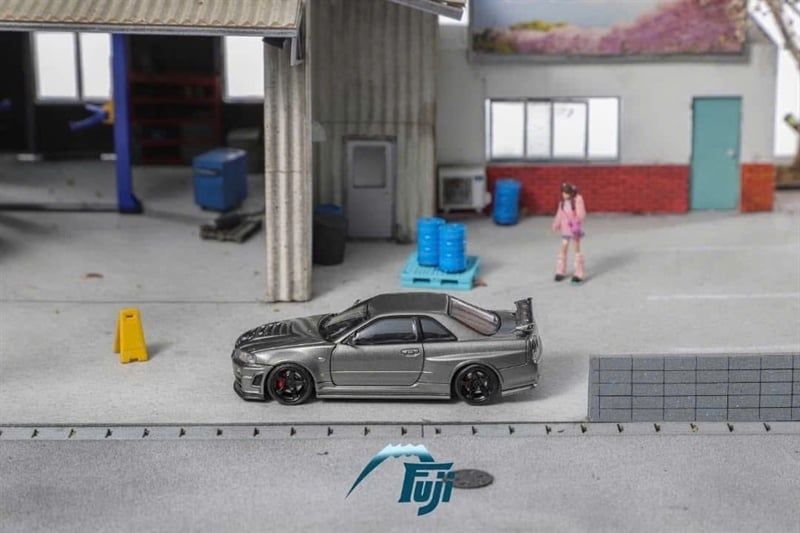  Mô hình xe Nissan Skyline GT-R R34 Z-Tune tỉ lệ 1:64 Fuji model OT64526 