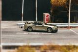  Mô hình xe Nissan Skyline GT-R R34 -- Millenium Jade tỉ lệ 1:64 Tarmac Works 