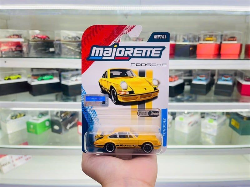  Mô hình xe Porsche 911 Carrera RS 2.7 yellow premium tỉ lệ 1:64 Majorette 8502100002 