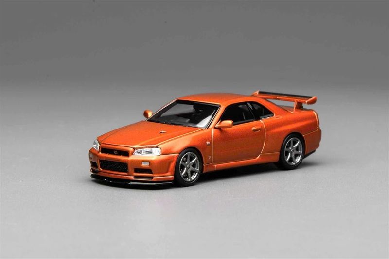  Mô hình xe Nissan Skyline GT-R (R34) V-Spec II Customized Metallic Orange tỉ lệ 1:64 Motorhelix M63471 