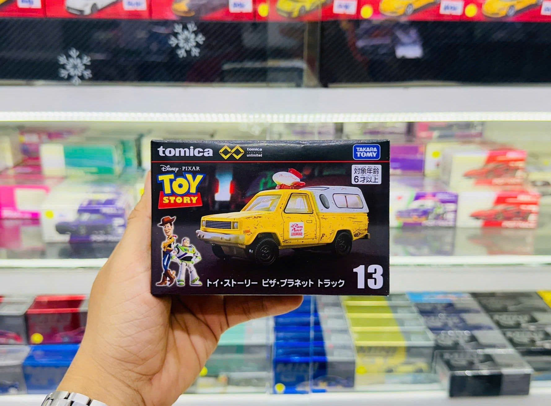  Mô hình xe Unlimited Toy Story Pizza Planet Car Tomica Premium 944201 