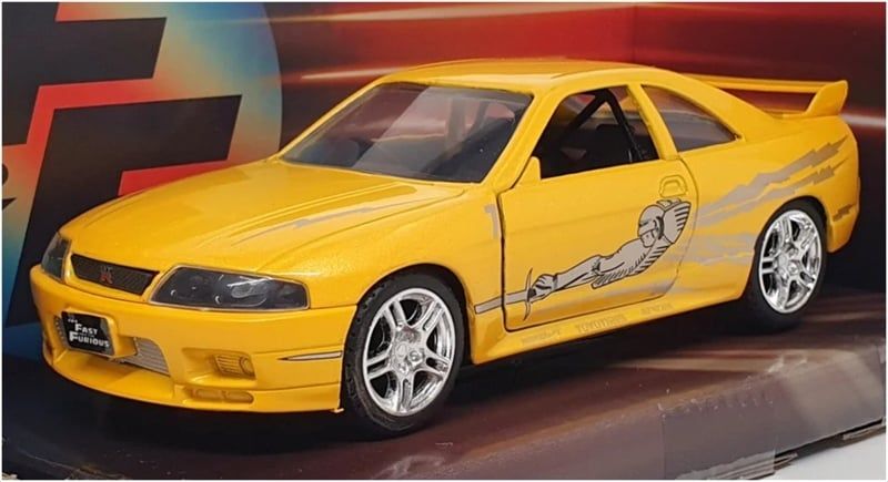  Mô hình xe Leon's Nissan Skyline GT-R (BCNR33), Yellow Fast & Furious tỉ lệ 1:32 Jada 24075-44 