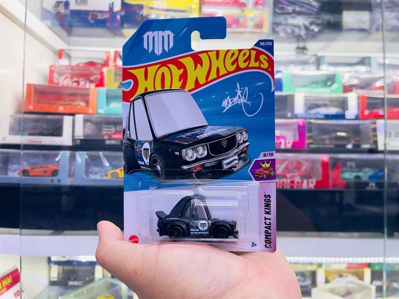  Mô hình xe Mazda RX3 Mainline - Compact Kings (xe thể thao) Hotwheels kim loại có bản quyền chính hãng tỉ lệ 1:64 C4982-ML 