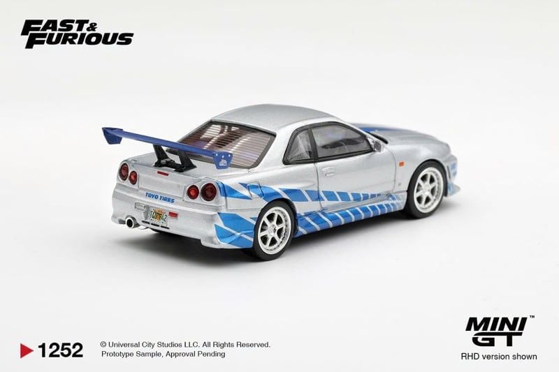  Mô hình xe Nissan Skyline GT-R C-West “2 Fast 2 Furious” Brian O’Conner bản card tỉ lệ 1:64 MiniGT MGT01252 