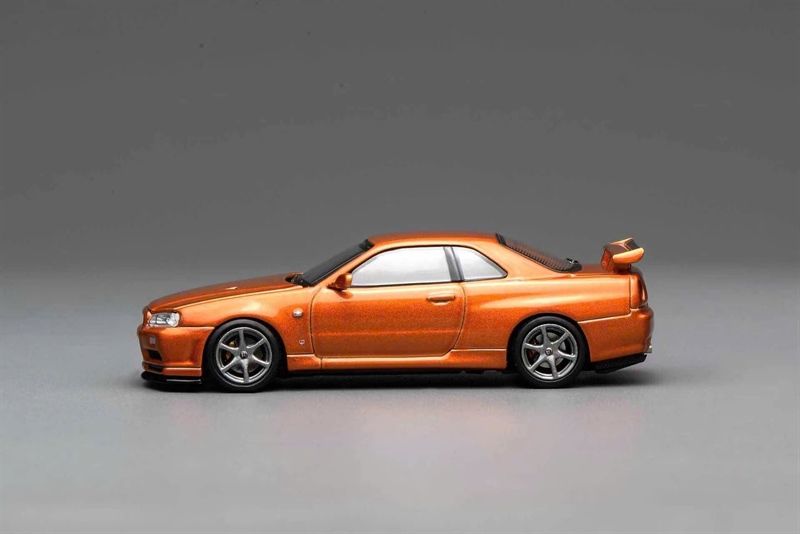  Mô hình xe Nissan Skyline GT-R (R34) V-Spec II Customized Metallic Orange tỉ lệ 1:64 Motorhelix M63471 