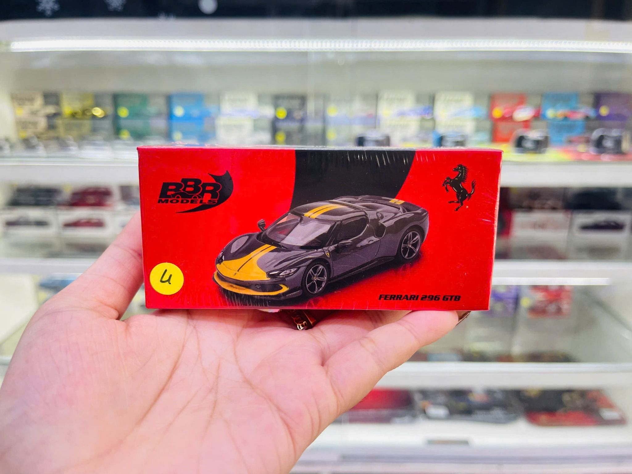  Mô hình xe ô tô Ferrari 296 GTB Assetto Fiorano Grigio Scuro tỉ lệ 1:64 BBR model BBRFER64007 