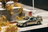  Mô hình xe Nissan Skyline GT-R R34 -- Millenium Jade tỉ lệ 1:64 Tarmac Works JC64-012-MJ-B 